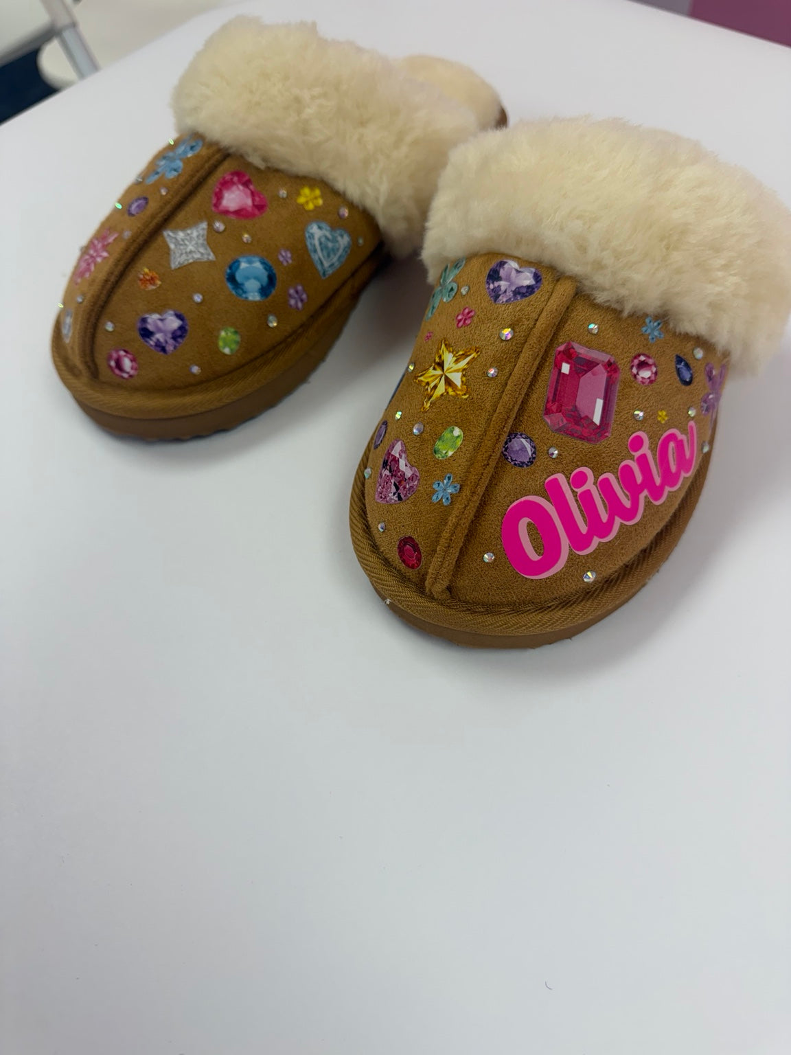 Pair of hand-decorated gem-inspired faux fur slippers