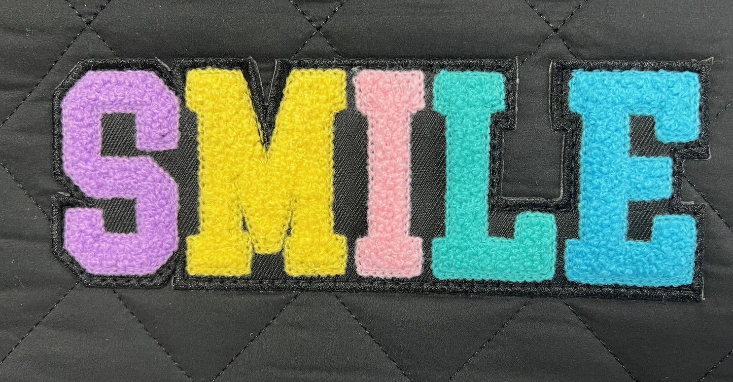 Black Puffer Backpack with Smile Patch