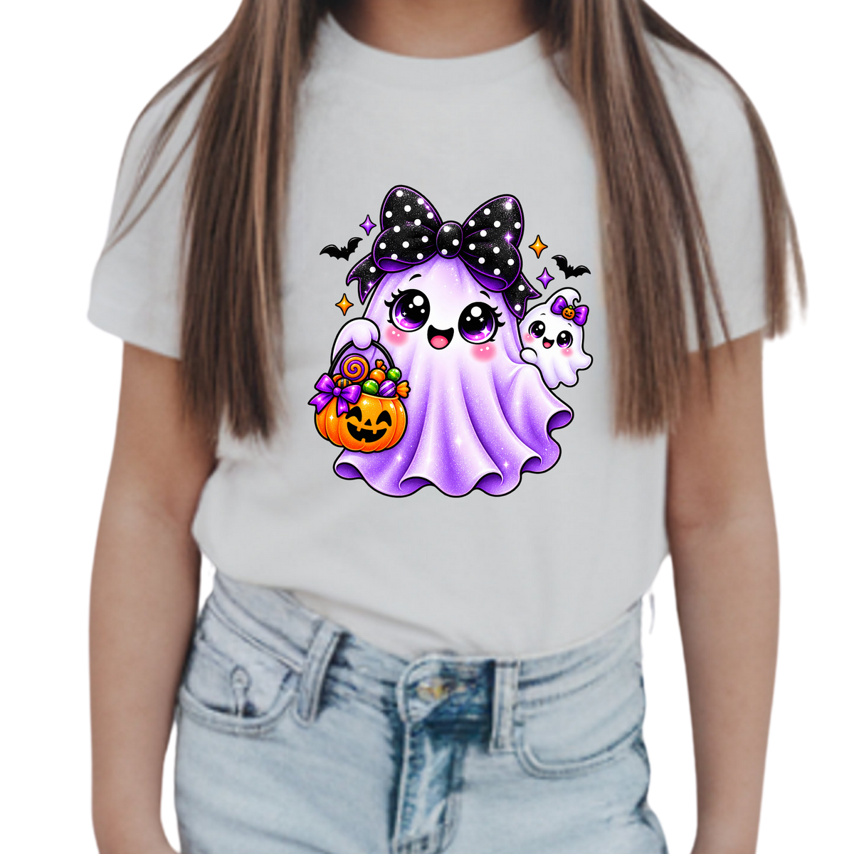 Girls’ Halloween T-shirt featuring an adorable purple Squishy Dumpling Ghost with a bow and pumpkin candy bucket.